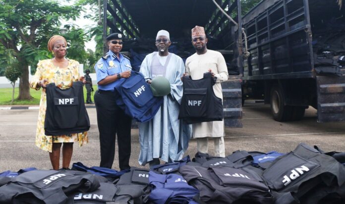 BULLETPROOF VESTS Director General Services (MPA), Mrs. Edemanya Ibilola Brayila, Inspector General of Police, IGP Alkali Usman Baba, Minister of Police Affairs, Dr. Mohammad Maigari Dingyadi, and Permanent Secretary, Temitope Fashedemi during The handing over was performed at the Nigeria |Police Force Headquarters, Louise Edet House, Abuja
