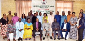 Sitting: Honourable Minister of Labour and Employment, Dr Chris Ngige, OON (3rd right); Director, Employment and Wages, Ministry of Labour, John Nyamali (4th right), and members of National Employment Council of Nigeria during their 8th meeting in Abuja
