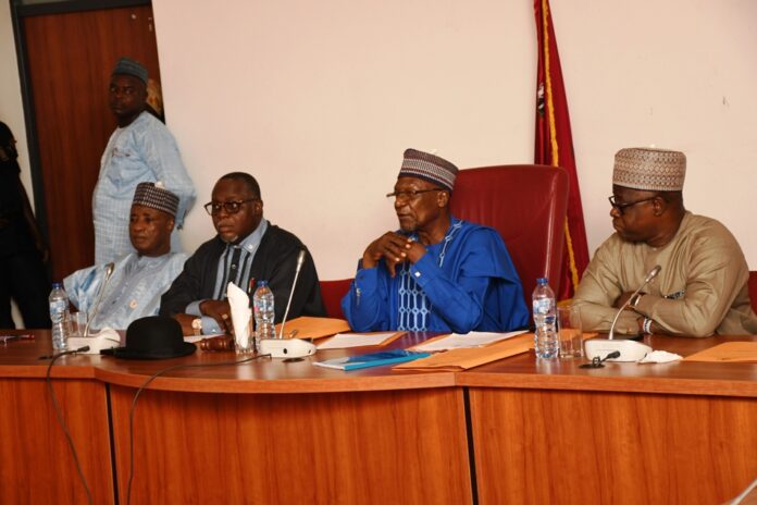 The Adhoc Committee on NNS Aradu led by Senator Yahaya Abdullahi (M) and his members during a meeting with the Defence Minister, Maj. Gen. Bashir Salihi Magashi in the Senate Building, National Assembly, Abuja