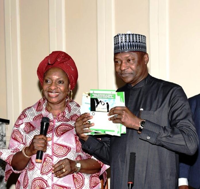 PIX 2 HON. MINISTER OF WOMEN AFFAIRS AND SOCIAL DEVELOPMENT, HER EXCELLENCY, DAME PAULINE TALLEN PRESENTING ADVOCACY DOCUMENTS ON CHILD RIGHTS ACT TO THE HON. ATTORNEY GENERAL OF THE FEDERATION/MINISTER OF JUSTICE ABUBAKAR MALAMI, SAN, CON DURING THE COURTESY CALL BY NATIONAL CHILD’S RIGHTS IMPLEMENTATION COMMITTEE LED BY HON. MINISTER OF WOMEN AFFAIRS AND SOCIAL DEVELOPMENT’ HER EXCELLENCY, DAME PAULINE TALLEN THURSDAY 3RD NOVEMBER, 2022 AT THE HAGF’S CONFERENCE ROOM, FEDERAL MINISTRY OF JUSTICE, ABUJA.