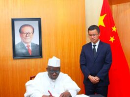 Chinese Ambassador to Nigeria, H.E Mr. Cui Jian Chun, and Minister of Police Affairs, Dr. Muhammad Maigari Dingyadi during a condolence visit to the Chinese Embassy in respect of the death of the former President Mr. Jiang Zemin.