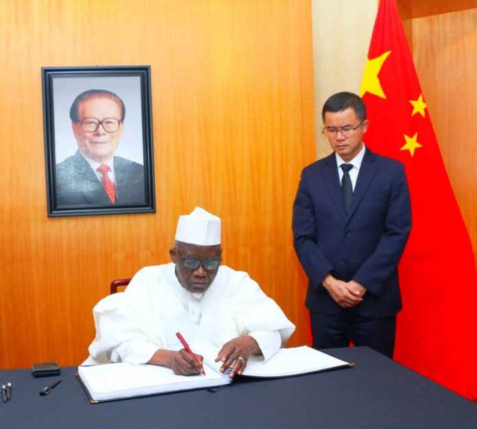 Chinese Dec 6.jpeg c Chinese Ambassador to Nigeria, H.E Mr. Cui Jian Chun, and Minister of Police Affairs, Dr. Muhammad Maigari Dingyadi during a condolence visit to the Chinese Embassy in respect of the death of the former President Mr. Jiang Zemin.