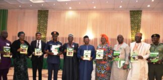 The Representative of the Vice President, Minister of Health, Dr. Osagie Ehanire (Centre), by his right hand side, Minister of Agriculture and Rural Development, Dr. Mohammad Mahmood Abubakar and by his left, Minister of Women Affairs, Dame Pauline Tallen, during the launch of the TADs Documents in Abuja.