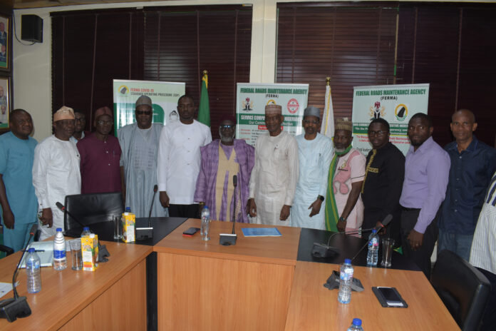 Pix 3 The President of the Nigerian Society of Engineers (NSE), Engr. Tasiu Sa’ad Gidari Wudil, FNSE, (M), flanked to his left by MD/CEO FERMA, Engr. Nuruddeen A. Rafindadi, FNSE, OFR with other Management staff in a group photograph during the President’s visit to the Agency.