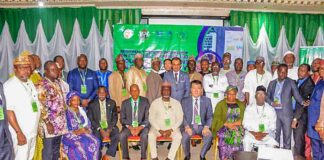 The Representative of the Minister of State for Agriculture and Rural Development, Dr. Ernest Umakhihe and Participants during the Workshop in Abuja.