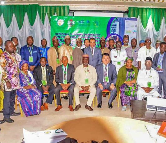 The Representative of the Minister of State for Agriculture and Rural Development, Dr. Ernest Umakhihe and Participants during the Workshop in Abuja.