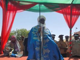The Minister "Sarkin Kudun Hausa" with his Staff of Office