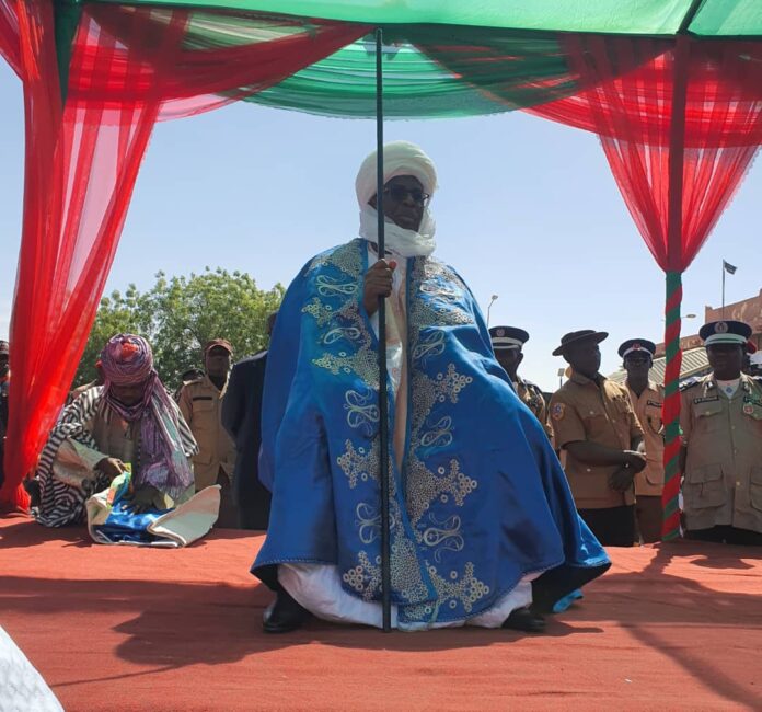 The Minister "Sarkin Kudun Hausa" with his Staff of Office