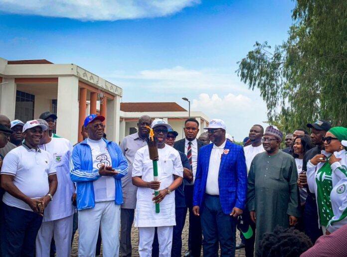 National Sports Festival 2022: Dare Arrives Asaba, Joins Okowa to Receive Torch of Unity