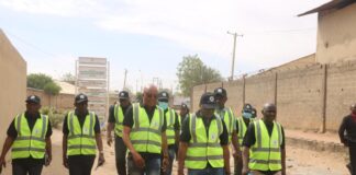 EPO Perm. Sec., Malam Shehu Ibrahim, mni on inspection tour with EPO Management at Bompai, Sharada and Challawa Industrial areas of Kano State