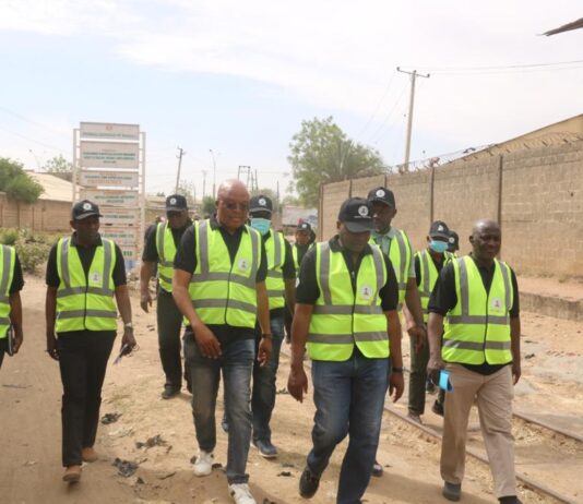 EPO Perm. Sec., Malam Shehu Ibrahim, mni on inspection tour with EPO Management at Bompai, Sharada and Challawa Industrial areas of Kano State