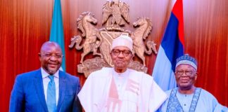 President Muhammadu Buhari with (L-R) Minister of Youth and Sports Development, Chief Sunday Dare and Chief of Staff, Professor Ibrahim Gambari during the presentation at the State House, Abuja. March 22. 2023