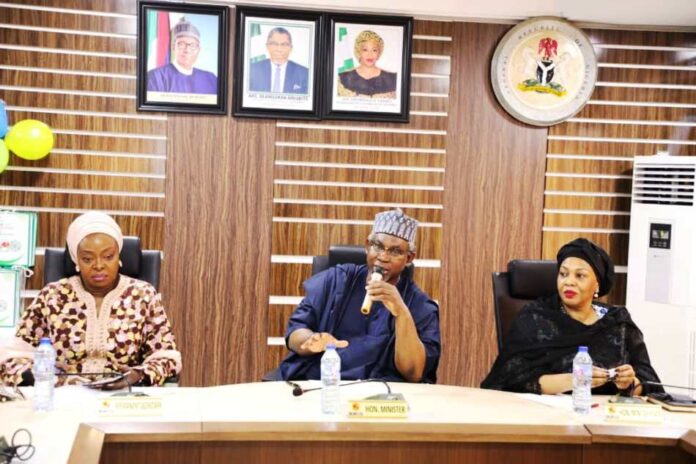 NIPSS, Kuru Jos The Honourable Minister, Federal Ministry of Mines and Steel Development, Arc Olamilekan Adegbite (M), flanked by the Honourable Minister of State, Mines and Steel Development Sen. Gbemisola Saraki (R) and the Permanent Secretary, Mines and Steel Development Dr Oluwatoyin Akinlade (L), while giving his welcome address during the visit of the members of Study Group 1, Senior Executive Course 45 ,2023 of National Institute For Policy and Strategic Studies NIPSS, Kuru Jos to the Ministry in Abuja.