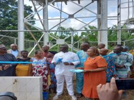 Pictures of Honourable Minister of State ,Budget and National planning, Prince Clem Ikanade Agba and Resident of Agbamogba community during commissioning community borehole at Agbamogba Community in Ovia North East LGA