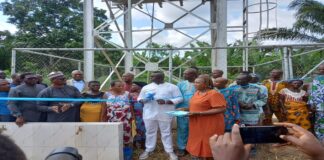 Pictures of Honourable Minister of State ,Budget and National planning, Prince Clem Ikanade Agba and Resident of Agbamogba community during commissioning community borehole at Agbamogba Community in Ovia North East LGA