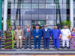 Picture of the Governor of Enugu State (middle) the Permanent Secretary Budget and National Planning (left) Enugu SSG (right) and other team members of PS entourage.