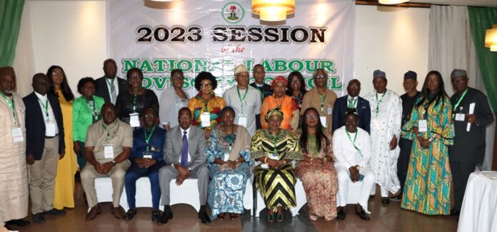 National Labour Advisory Council Sitting: Permanent Secretary, Federal Ministry of Labour and Employment (FML&E), Kachollom Daju, mni (middle); Retired Permanent Secretary, Federal Ministry of Labour, Dr Peter Tarfa (3rd left); Director, Productivity Measurement, FML&E, Juliana Adebambo (3rd right); Director General Nigeria Employers Consultative Association, Adewale Smarth (2nd left); Representative of ILO, Chinyere Emeka-Anuna (2nd right); NLC Representative, Comrade Titus Amber (left); TUC Representative, Comrade (Dr) Tommy Etim (right) and other Council members at the 2023 meeting of the National Labour Advisory Council (NLAC), Uyo, Akwa Ibom State