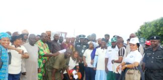 Acting Chairman, Branch One long journey, Jabi Park, Mr. Gabriel Oke; Commissioner of Police, CP Abaniwonda S. Olufemi; Deputy Director, Police Inspectorate Department, Ministry of Police Affairs, Mrs. Rufus-Edegba I. Immaculate and transporters at the Jabi park during the sensitization campaign by members of the Police Public Complaints Committee (PPCC) in the Federal Capital Territory, Abuja.