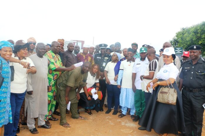Police Public Complaints Committee Acting Chairman, Branch One long journey, Jabi Park, Mr. Gabriel Oke; Commissioner of Police, CP Abaniwonda S. Olufemi; Deputy Director, Police Inspectorate Department, Ministry of Police Affairs, Mrs. Rufus-Edegba I. Immaculate and transporters at the Jabi park during the sensitization campaign by members of the Police Public Complaints Committee (PPCC) in the Federal Capital Territory, Abuja.