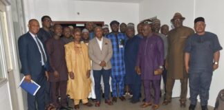 Permanent Secretary MPR, Amb. Gabriel T. Aduda (c), flanked by Director Upstream (MPR) Engr. Kamoru Busari (5th right), Prof. I.A. Mohammed Dabo (3rd left) and other members of the committee in a group photograph to mark the end of the inauguration ceremony.