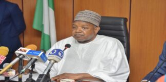 Picture of the HONOURABLE MINISTER OF BUDGET AND ECONOMIC PLANNING SENATOR ABUBAKA ATIKU BAGUDU CON DURING PRESS BRIEFING
