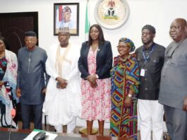 Permanent Secretary, Federal Ministry of Labour and Employment, Kachollom Daju, mni (meedle); Director, Occupational Safety and Health, Loretta Adogu (3rd right) with the newly Inaugurated committee members, Abuja