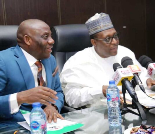 (Right) Prof. Muhammad Ali Pate, Coordinating Minister of Health and Social Welfare (Left) Dr. Tunji Alausa, Minister of State for Health and Social Welfare