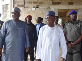 R-L: Minister, Ministry of Niger Delta Development, (MNDD), Engr. Abubakar Momoh and the Permanent Secretary, MNDD, Dr. Shuaib Belgore, inspected a completed two kilometers road, in Ikot Udoe Town and the State office of the Ministry under construction. At both levels the Minister expressed satisfaction on the completed 2 kilometres road and the quality of job of the State office which is still under construction.