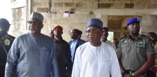 R-L: Minister, Ministry of Niger Delta Development, (MNDD), Engr. Abubakar Momoh and the Permanent Secretary, MNDD, Dr. Shuaib Belgore, inspected a completed two kilometers road, in Ikot Udoe Town and the State office of the Ministry under construction. At both levels the Minister expressed satisfaction on the completed 2 kilometres road and the quality of job of the State office which is still under construction.