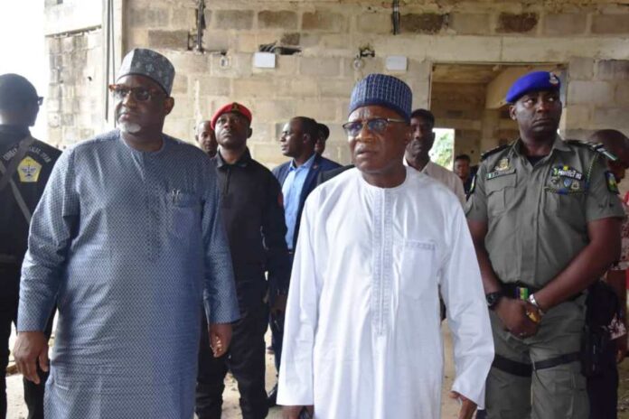 R-L: Minister, Ministry of Niger Delta Development, (MNDD), Engr. Abubakar Momoh and the Permanent Secretary, MNDD, Dr. Shuaib Belgore, inspected a completed two kilometers road, in Ikot Udoe Town and the State office of the Ministry under construction. At both levels the Minister expressed satisfaction on the completed 2 kilometres road and the quality of job of the State office which is still under construction.