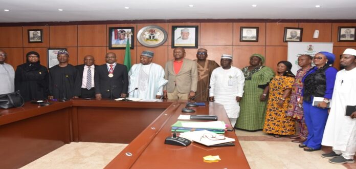 Bagudu charges ICAN to avail itself with document generated from Agenda 2050 development plan. Pictures of (Centre)His Excellency, Senator Abubakar Bagudu, Minister for Budget and Economic Planning, flanked by Mr Innocent Okwuosa , President, Chartered Institute of Accountants of Nigeria(5th-L), other ICAN delegates and director's from the Ministry, during a courtesy visit, in Abuja.