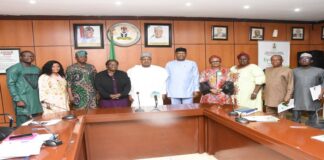 picture of the Honourable Minister ,Budget and Economic Planning ,Country Director IFAD, , the permanent secretary and directors in the ministry during a courtesy visit by IFAD team to the Honourable Minister at the Minister;s conference room.