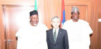 Honourable Minister of Defence, Muhammed Badaru Abubakar CON, mni (L); Honourable Minister of State for Defence Dr. Mohammed Bello Matawalle (R) and Japan Ambassador to Nigeria, Matsunaga Kazuyoshi (M) in a group photograph during the courtesy visit to Ship House, Abuja
