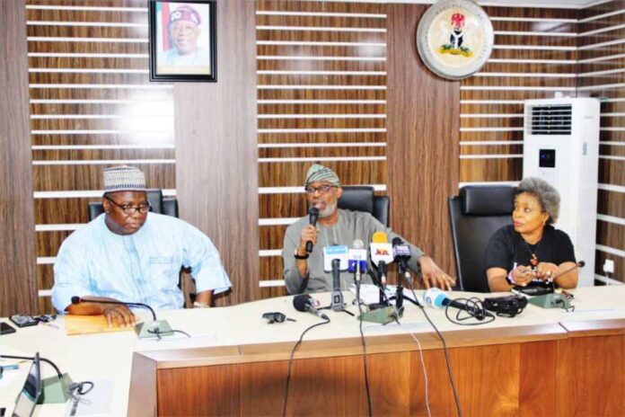 Maiden Press Conference By the Hon. Min. of Solid Minerals Devpt. Mr Dele Alake: supported on his right by the representative of the Permanent Secretary; Mr Mohammed Suleiman mni; (Director, Human Resource Management Dept); on his Left is the Director, Mines Environmental Compliance Dept., Dr Vivian Okono