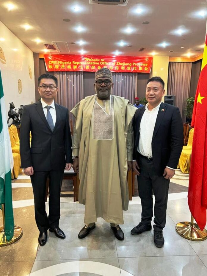 The Minister of State, Ministry of Steel Development, HIs Excellency, Uba Maigari Ahmadu, (M) with Mr Guo Pengwen, Commercial Counsellor, Chinese Embassy, (L) and Chief Eric Ni, Chairman, China Industrial and Commerce Enterprise Association (R) at the Mid Autumn Festival and Chinese National Day Celebration held on Friday, 22nd September 2023 in Lagos.