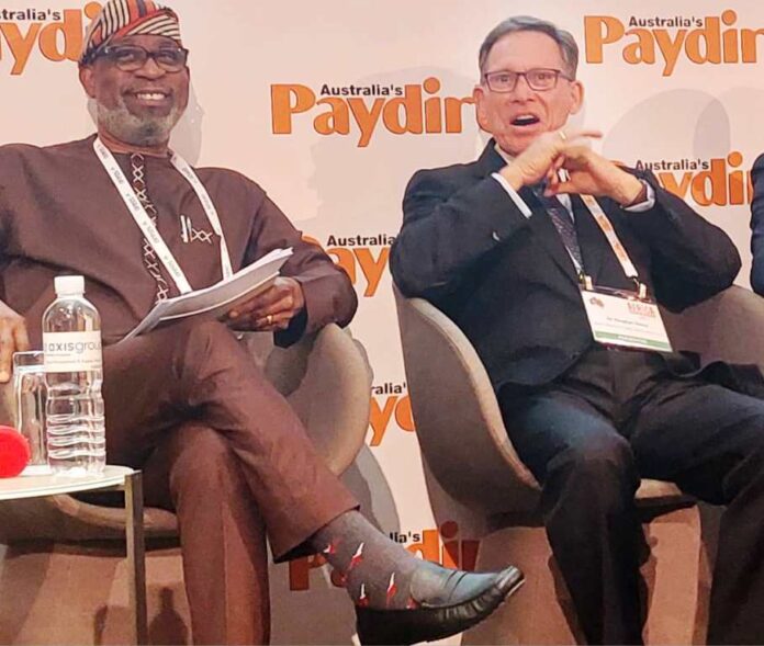 Minister of Solid Minerals, Mr. Oladele Alake discussing investment in mining in Nigeria with Managing Director, Basin Nigeria Limited, Dr.Steven Davies during the fourth session of the Africs Down Under mining conference in Perth, Austrralia on Wednesday.