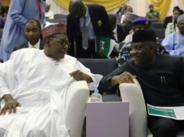 (Coordinating Minister of Health & Social Welfare) Prof. Muhammad Ali Pate and the (Minister of State for Health & Social Welfare) Dr. Tunji Alausa in a conversation at the Ministerial Briefing