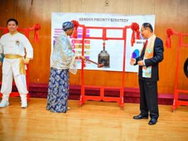 First Lady of the Federal Republic of Nigeria Senator Oluremi Tinubu CON rings the bell of peace, the 517th person to do so in the world and is observed by Dr Hong Tao-Tze, President of World Federation of World Peace and Love at the Commemoration of the International Day of Peace in New York