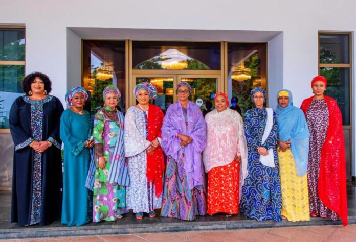 courtesy visit to the First Lady From left to right: Mrs. Rachel Umahi, Mrs. Rachel John Owen, Mrs. Bilikisu Kyari, Mrs. Susan Lokpobiri, Her Excellency Senator Oluremi Tinubu Mrs. Zainab Alkali, Mrs. Mattawale Bello, Hajia Hajara Goronyo, and Dr Saadatu Abdullahi after a courtesy visit to the First Lady of the Federal Republic of Nigeria by wives of Ministers