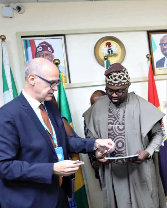 R-L, The Honourable Minister of Interior,Dr Olubunmi Tunji-Ojo and the UNDOC representative in Nigeria Mr Oliver Stolpe, during the courtesy visit to the Minister in his Office today.