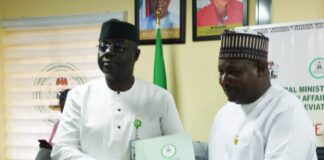 The new Permanent Secretary, Federal Ministry of Humanitarian Affairs and Poverty Alleviation, Abel Olumuyiwa Enitan (left) and the out-going Permanent Secretary Dr Nasir Sani-Gwarzo, mni, NPOM, during the handing and taking over of office held on Friday 1st August 2023 at the Ministry's conference room, Federal Secretariat. Abuja.