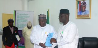 New Permanent Secretary, Ministry of Police Affairs, Dr. Nasir Sanni-Gwazor and outgoing (Perm Sec) Mr. Abel Olumuyiwa Enitan exchanging handover note at the Ministry’s Headquarters in Abuja.