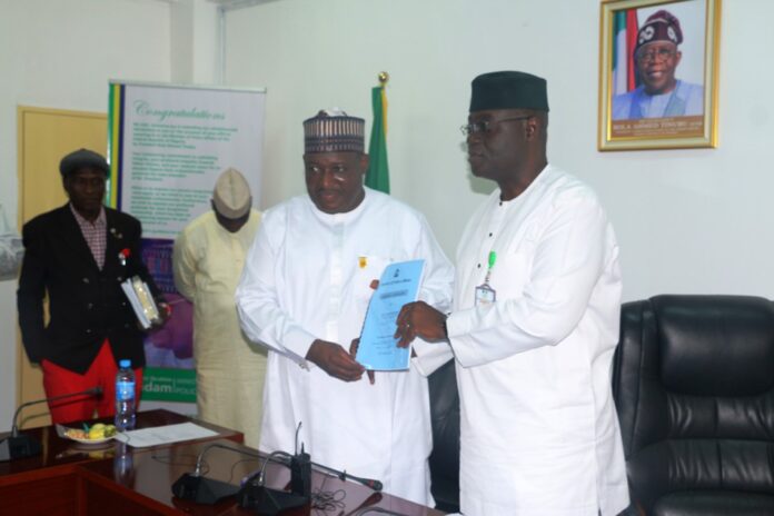 handing over ceremony New Permanent Secretary, Ministry of Police Affairs, Dr. Nasir Sanni-Gwazor and outgoing (Perm Sec) Mr. Abel Olumuyiwa Enitan exchanging handover note at the Ministry’s Headquarters in Abuja.