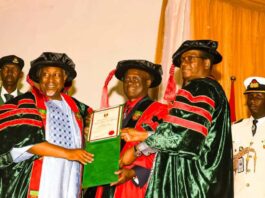L-R: Honourable Minister of Defence, Mohammed Badaru Abubakar CON, mni, Gen. Martin Luther Agwai rtd and the Honourable Minister of State for Defence, Dr. Bello Muhammed Matawalle MON presenting Honorary Doctorate Degree Certificate to Agwai at the 33rd Convocation ceremony of NDA Cadets of 70 Regular Course, Postgraduate Students and Honorary Degree programme.