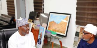 Hon. Minister of Solid Minerals Development, Dr. Oladele Alake, exchanging views with Mr. Samaila Zubairu, President/Chief Executive Officer, Africa Finance Cooperation.