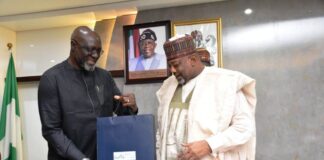 L-R, The Country Director, GAIN, Dr. Micheal Ojo and Minister of Agriculture and Food Security, Sen. Abubakar Kyari, during the Courtesy Visit in Abuja.