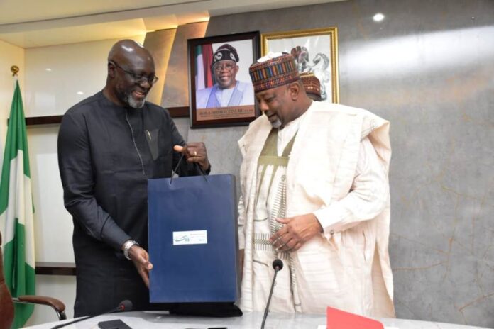 Courtesy Visit in Abuja L-R, The Country Director, GAIN, Dr. Micheal Ojo and Minister of Agriculture and Food Security, Sen. Abubakar Kyari, during the Courtesy Visit in Abuja.