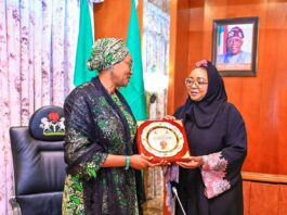 The First Lady of the Federal Republic of Nigeria, Senator Oluremi Tinubu CON (left) receiving a plaque from the Minister of State for Police Affairs Hon Imaan Suleiman-Ibrahim while on a courtesy visit to her office at the State House, Abuja on Monday 9th October 2023