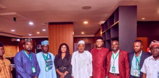 pictures of His Excellency Senator Abubakar Atiku Bagudu, Minister of Budget and Economic Planning (C), Nebeolisa Anako, Permanent Secretary (R), Comrade Isaac Mtom Managing Director Markolima Consultancy Academy (3rd right)and other director's from the Ministry during a courtesy visit to the Honourable Minister in Abuja.