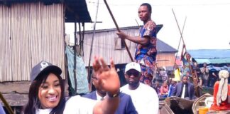 Honourable Minister of Humanitarian Affairs and Poverty Alleviation, Dr. Betta Edu (in front waiving) taking a canoe trip to one of the Communities in Makoko, a lagos suburb to flag off the National Social Register verification, over the weekend.
